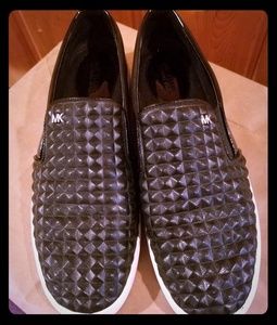 Michael Kors black slip ons